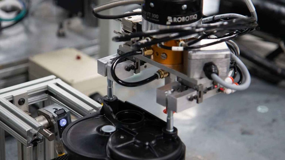 The cobot communicates with the printers via email communication
