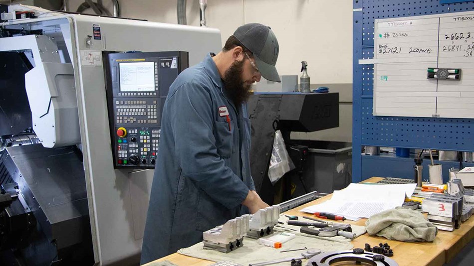 Robots at cnc chute